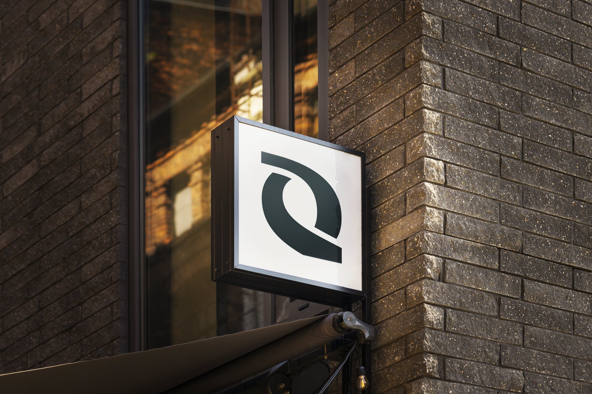 Pearl Street Wealth Partners identity — square projecting sign mockup