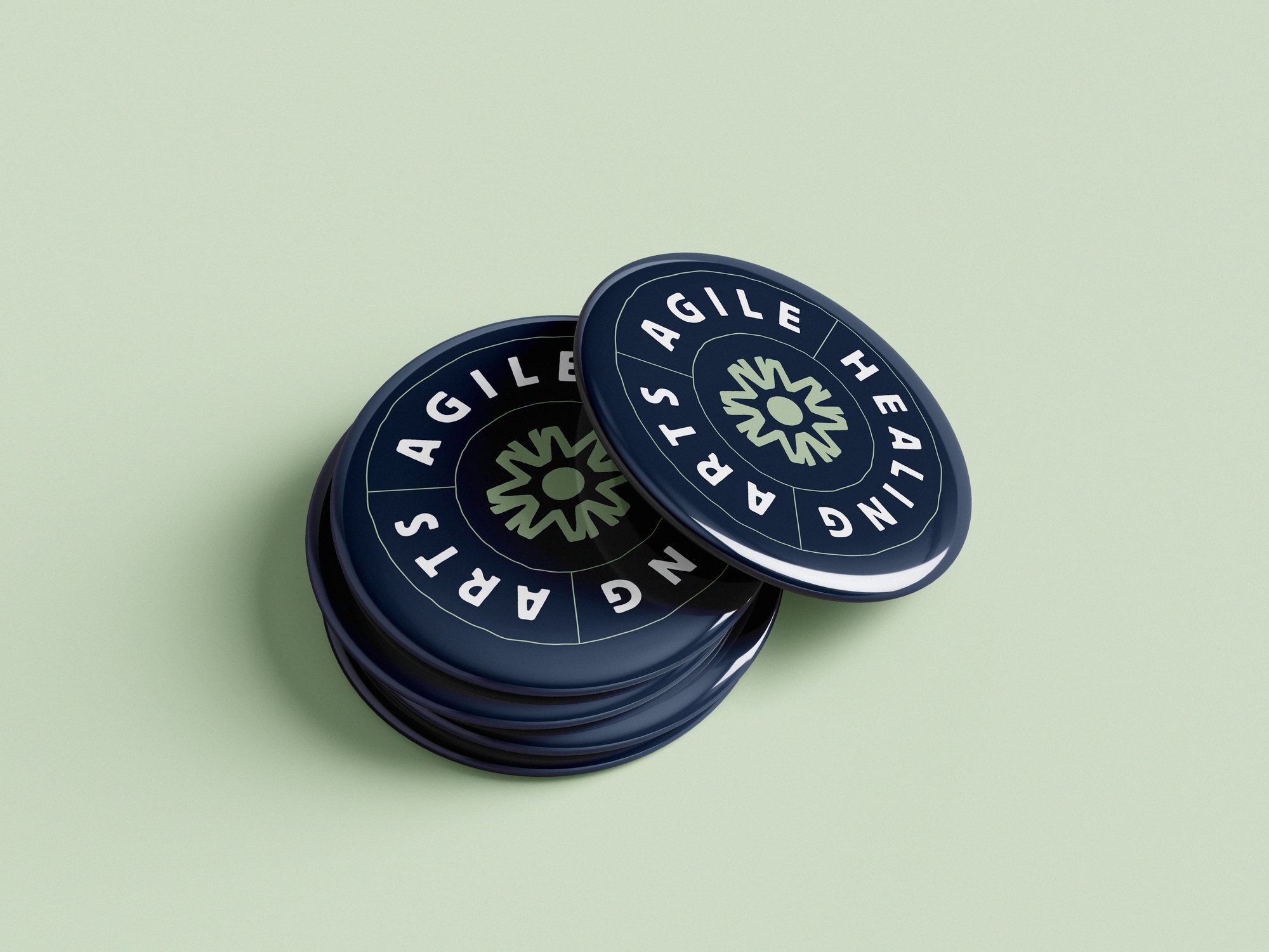 Agile Healing Arts branding — round fridge magnets mockup