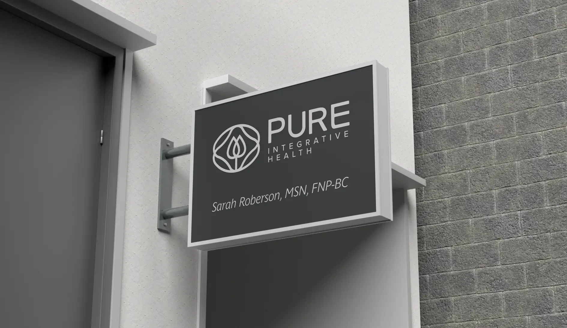 Pure Integrative Health branding — exterior practice sign mockup with the PURE logo