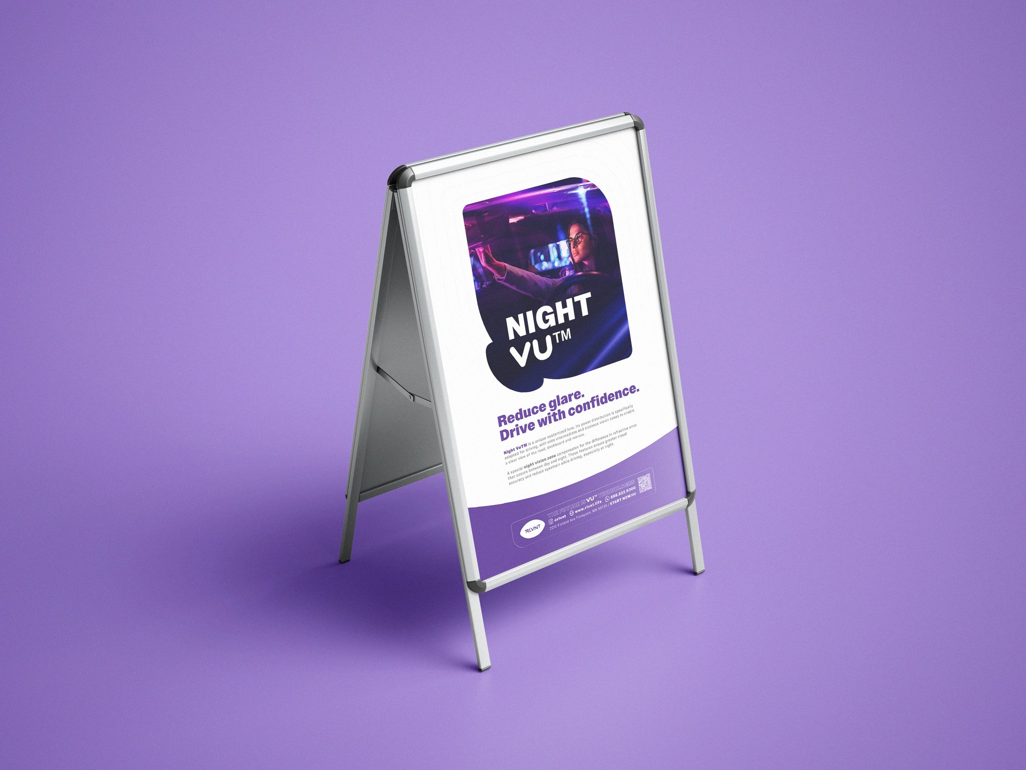 RLVNT NightVU branding — purple sidewalk stand mockup