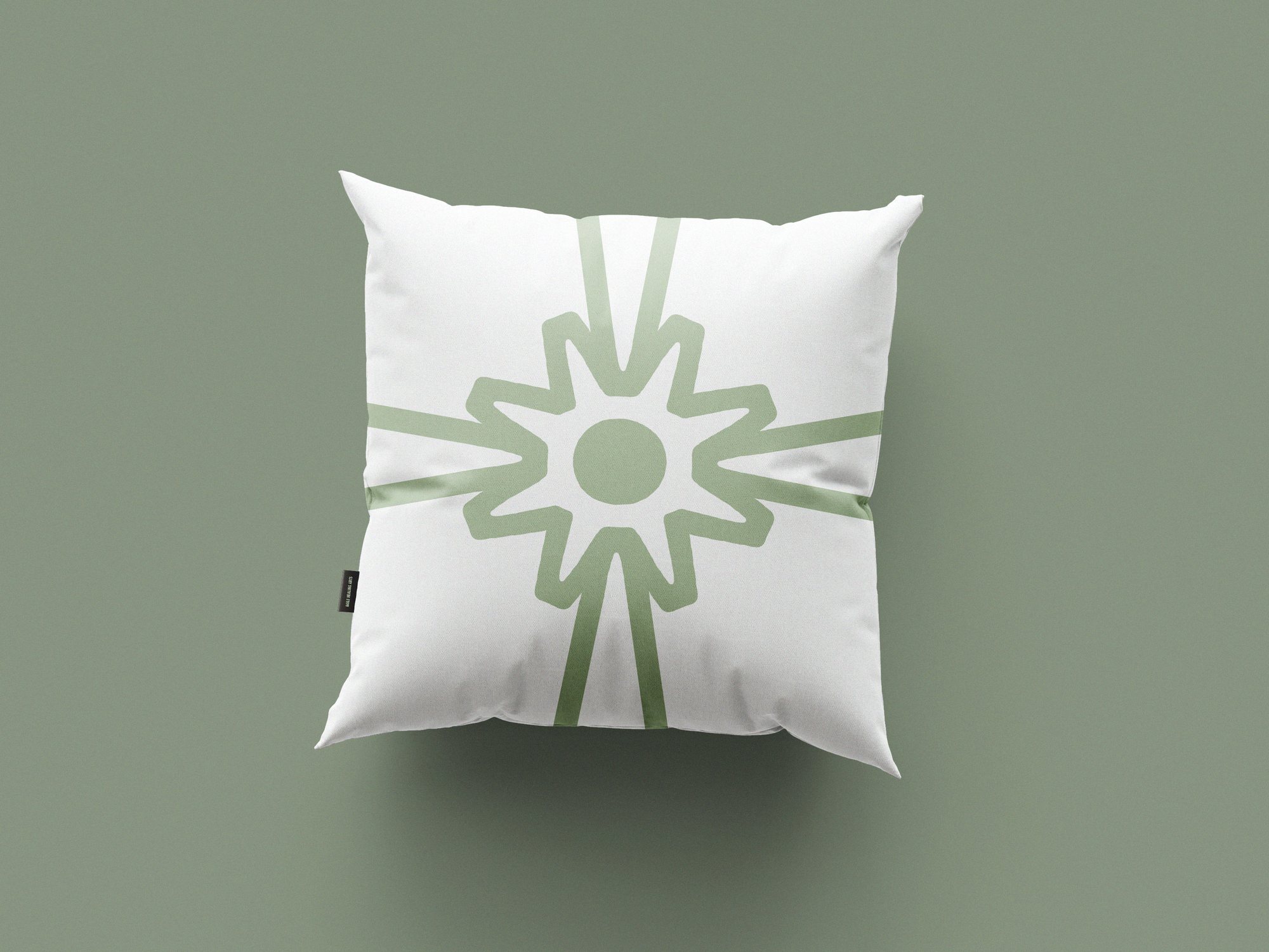 Agile Healing Arts branding — sage symbol pillow mockup