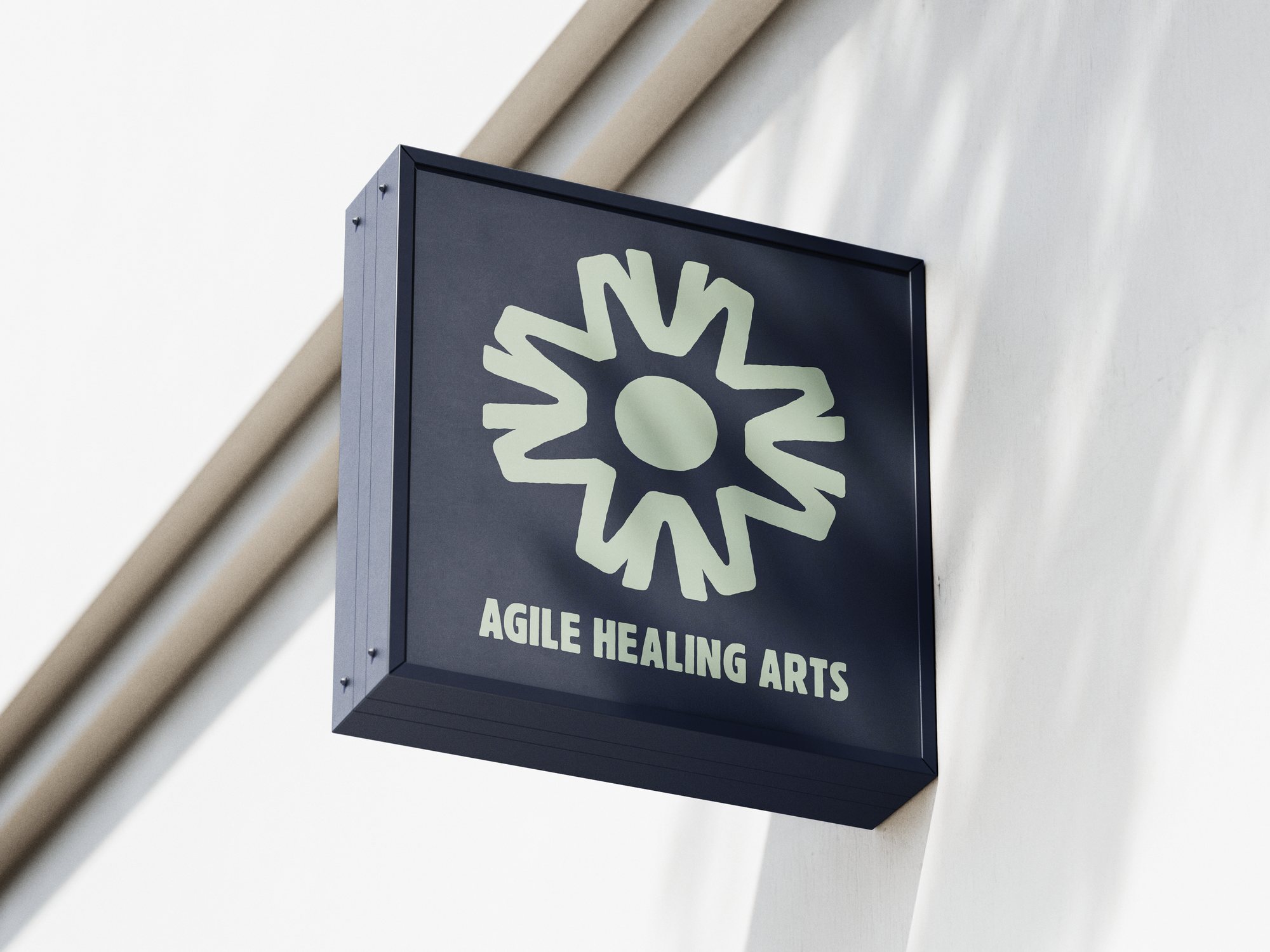 Agile Healing Arts branding — projecting square sign mockup